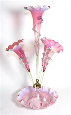 Lot 286 - A Large Pink Vaseline Glass Epergne, with frilled rims, the central trumpet vase flanked by...