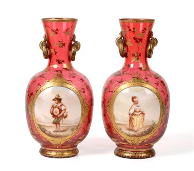 Lot 306 - A Pair of Bohemian Ruby Glass Vases, circa 1860, of ovoid form, the flared necks with loop handles