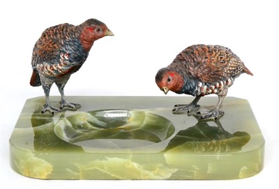 Lot 378 - An Austrian Cold Painted Bronze and Onyx Ashtray, early 20th century, as two partridge on a...