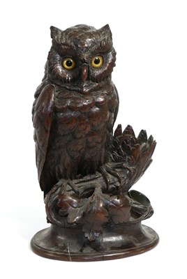 Lot 400 - A Black Forest Carved Wood Tobacco Box, early 20th century, in the form of an owl with glass...