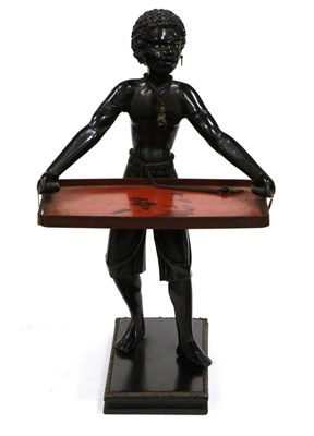 Lot 413 - A Leuchers Ebonised and Lacquer Figural Visiting Card Stand, late 19th century, as an African...