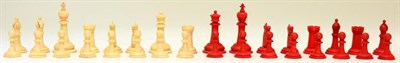 Lot 416 - A Stained and Natural Bone Chess Set, kings 6.8cm high