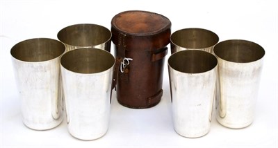 Lot 421 - A Set of Six Silver Plated Beakers, Walker & Hall, in a leather travelling case