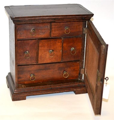 Lot 433 - An Oak Table-Standing Spice Cabinet, early 18th century and later, the moulded cornice above...