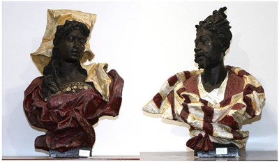 Lot 435 - A Pair of Austrian Painted Terracotta Busts of Blackamoors, circa 1900, both wearing...