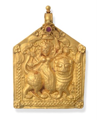 Lot 437 - An Asian Plaque Pendant, embossed with the figure of Durga upon a lion, with a red paste inset...