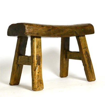 Lot 446 - A Primitive Country Made Child's Stool, on four legs tied by stretchers, 27cm long