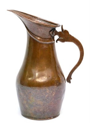 Lot 447 - An Islamic Copper Ewer, probably 18th/19th century, of baluster form with bifurcated handle,...