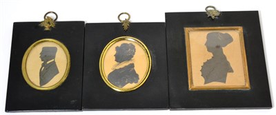 Lot 454 - Three 19th Century Miniature Silhouette Portraits, in black lacquered frames