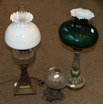 Lot 471 - A Brass Oil Lamp, with green overlay white glass shade, cut glass reservoir and fluted column...