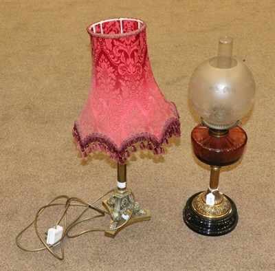 Lot 476 - A Victorian Brass Oil Lamp, with etched shade, cranberry reservoir and fluted column, 58cm...