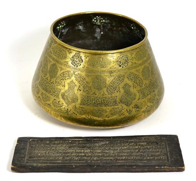 Lot 485 - A Persian Brass Cache Pot, of conical form, engraved and pierced with calligraphy and...