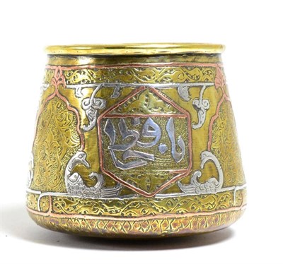 Lot 487 - A Persian Silver and Copper Inlaid Brass Small Pot, 19th century, of tapering cylindrical form,...