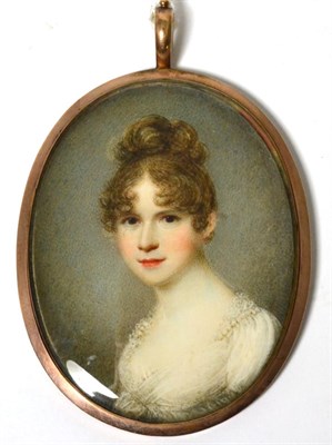 Lot 505 - Charles Hayter (British, 1761-1835): A Miniature Bust Portrait of a Girl, with hair up, wearing...