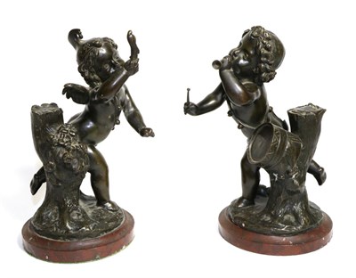 Lot 517 - A Pair of Bronze Figures of Putti, French, late 19th century, one playing a drum and pipes, the...