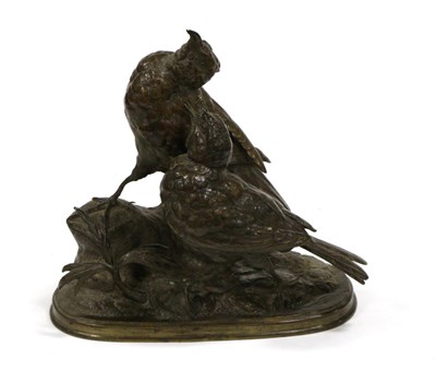 Lot 525 - A Bronze Group of Two Birds, French, 19th century, on a foliate cast rocky base and oval...