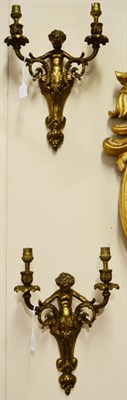 Lot 529 - A Set of Eight Bronze Twin-Light Wall Sconces, in 18th century style, with scroll branches flanking