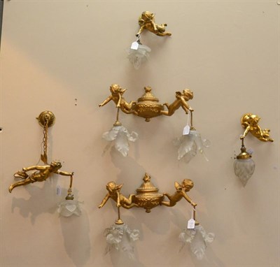 Lot 532 - Five Gilt Metal Light Fittings, early 20th century, comprising a pair of two-branch wall lights...