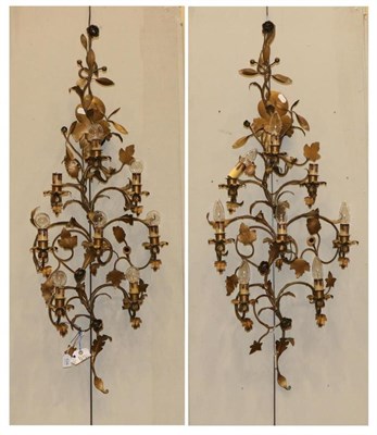 Lot 534 - A Pair of Gilt Metal Eight-Light Electric Wall Sconces, 20th century, with leaf scroll...