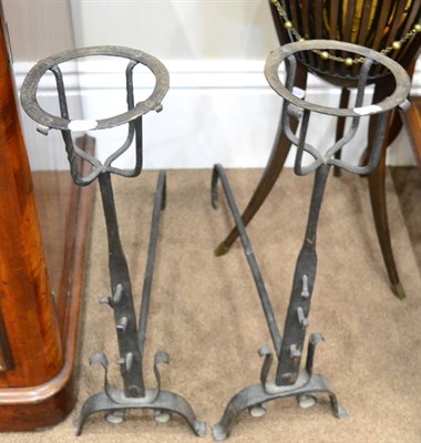 Lot 541 - A Pair of Late 17th Century French Andirons, with basket finials on scroll bases, 72cm high