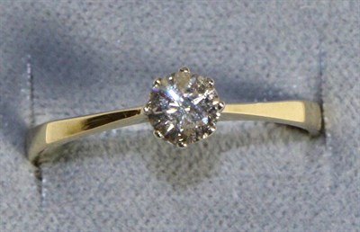 Lot 600 - An 18 Carat Gold Solitaire Diamond Ring, a round brilliant cut diamond in a claw setting, to...