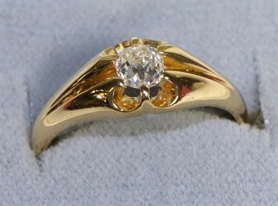 Lot 604 - An 18 Carat Gold Solitaire Diamond Ring, an old cut diamond in a claw setting, to a tapering shank