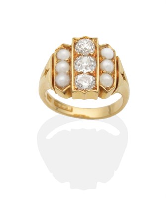 Lot 615 - A Diamond and Split Pearl Plaque Ring, three old cut diamonds between sets of three split...