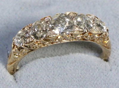 Lot 616 - A Diamond Five Stone Ring, graduated old cut diamonds with single-cut diamond accents, to a...