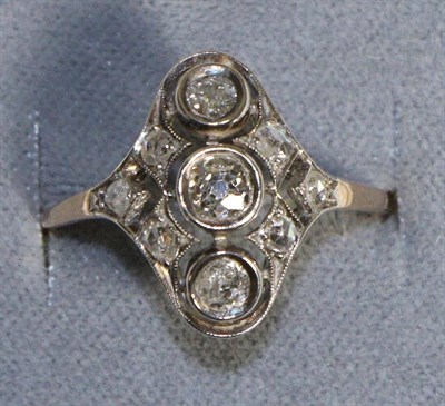 Lot 623 - A Diamond Plaque Ring, three graduated old cut diamonds in milgrain settings, to a pierced...