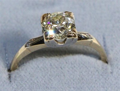 Lot 624 - A Solitaire Diamond Ring, an old cut diamond in a square claw setting, to diamond set knife...