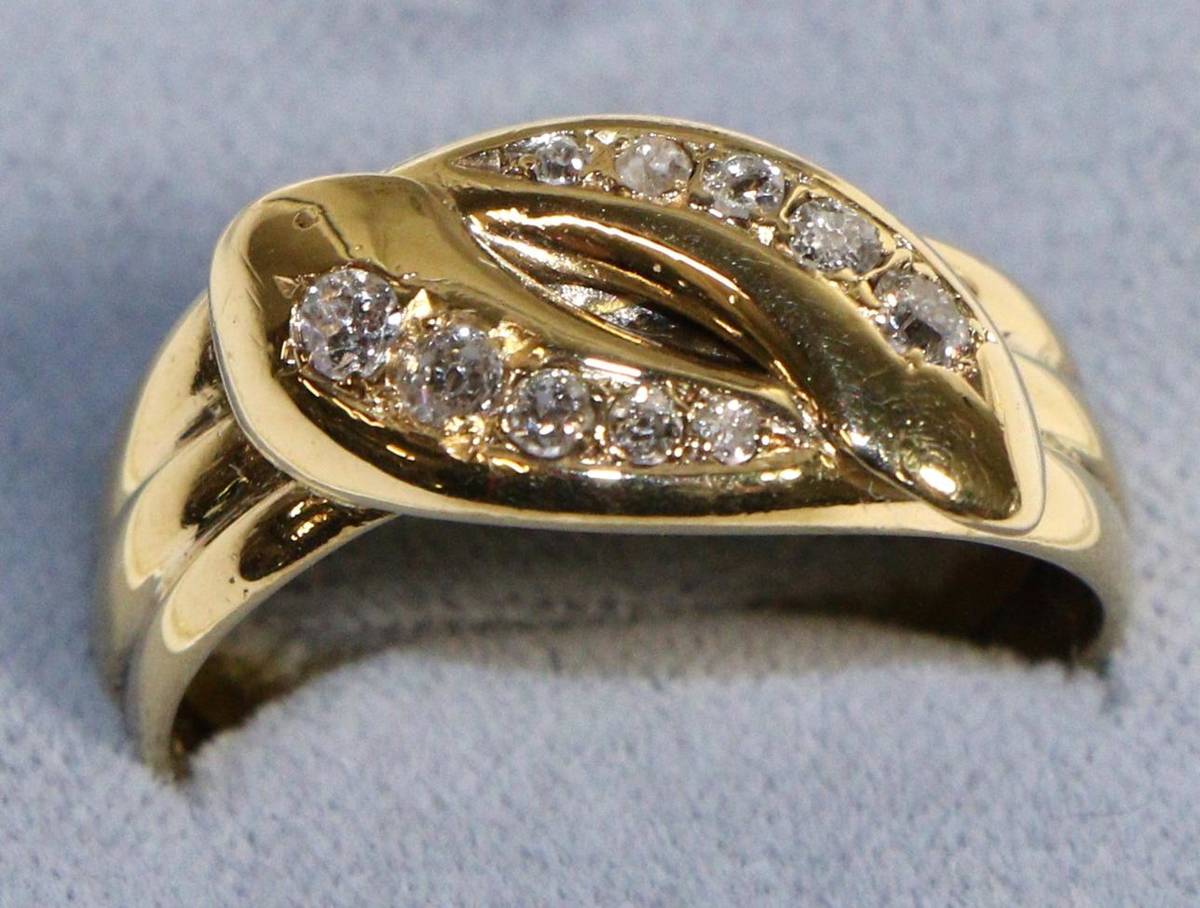 Lot 629 - An 18 Carat Gold Diamond Snake Ring, as two