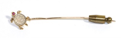 Lot 642 - A Moonstone, Ruby and Diamond Sea Turtle Stick Pin, with a carved moonstone shell, a ruby set...