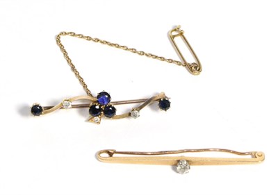 Lot 648 - A Sapphire and Diamond Brooch, three round cut sapphires in a clover formation with an old cut...