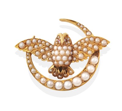 Lot 663 - A Seed Pearl Owl and Crescent Brooch, modelled with outstretched wings and ruby set eyes,...