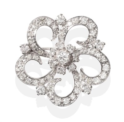 Lot 664 - A Diamond Flower Brooch, a round brilliant cut diamond within a border of smaller round...