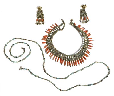 Lot 675 - An Egyptian Revival Coral and Ceramic Bead Collet Necklace and Clip Earring Suite, the stiff collet