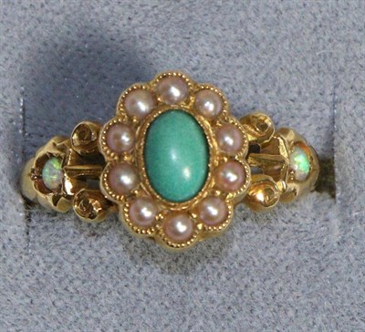 Lot 688 - An 18 Carat Gold Turquoise, Opal and Seed Pearl Ring, an oval cabochon turquoise in a rubbed...