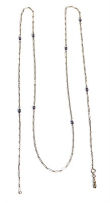 Lot 695 - A Rose Coloured Long Link Chain with amethyst and rock crystal beads at intervals, with clip...