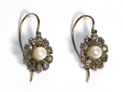 Lot 696 - A Pair of Pearl and Diamond Cluster Earrings, a cultured pearl within a petal surround set with...