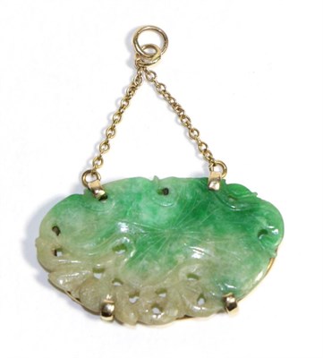 Lot 705 - A Jade Pendant, a carved and pierced jade plaque depicting a lotus leaf, in a claw setting,...