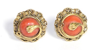 Lot 717 - A Pair of Coral Earrings, a coral bead entwined by a coiled snake motif, within a rope link...