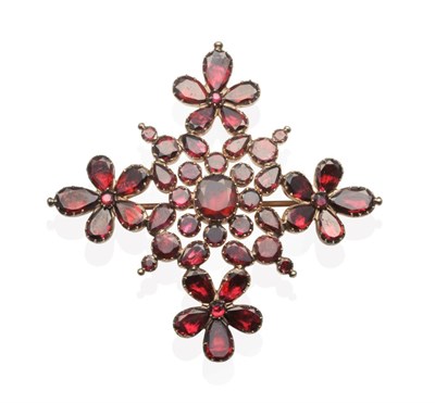 Lot 719 - A Georgian Flat Cut Garnet Brooch, vari-cut garnets in closed back collet settings as a foliate...