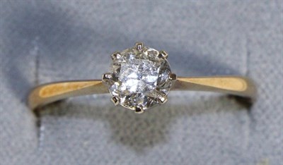 Lot 745 - A Solitaire Diamond Ring, an old cut diamond in a claw setting, to knife edge shoulders,...