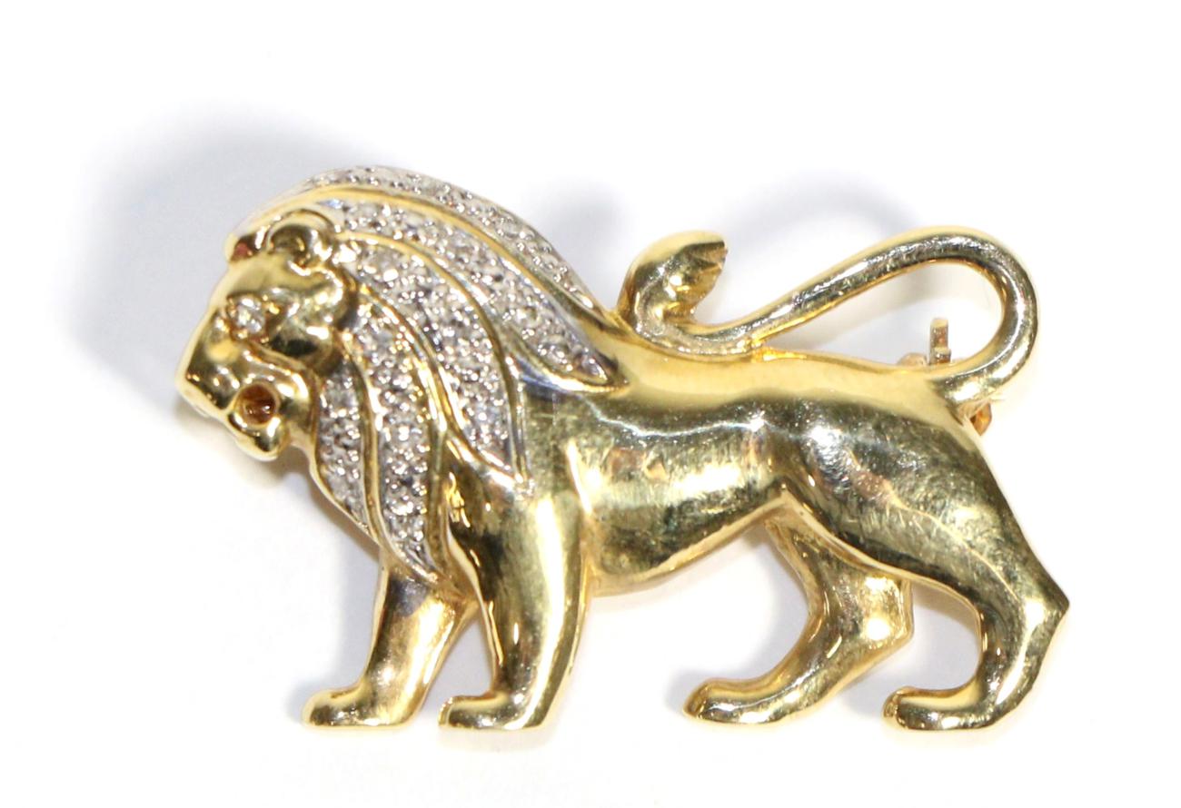 Lot 753 - A Diamond Lion Brooch, modelled in a walking pose with a diamond set eye and mane, stated...