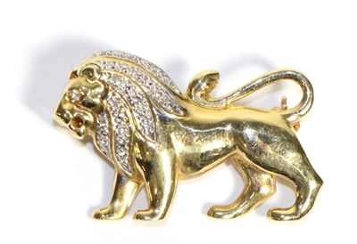 Lot 753 - A Diamond Lion Brooch, modelled in a walking pose with a diamond set eye and mane, stated...