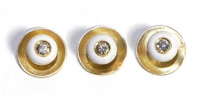 Lot 760 - A Set of Three Old Cut Diamond and White Enamel Dress Studs, total estimated diamond weight...