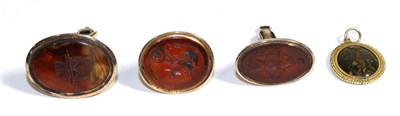 Lot 762 - Three Georgian Carnelian Set Intaglio Seals, depicting the bust of Mars, an allegory of hope...