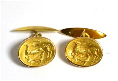 Lot 765 - A Pair of Cufflinks, dished oval plaques engraved with a motif of a goat and kid, chain linked...