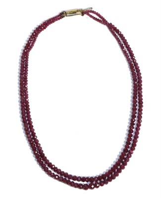 Lot 769 - A Ruby Bead Necklace, a double strand of graduated faceted ruby beads, length 40cm