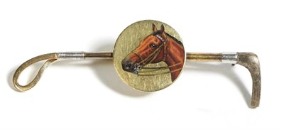 Lot 772 - An Enamelled Equine Portrait Crop Brooch, measures 2.5cm by 6.5cm